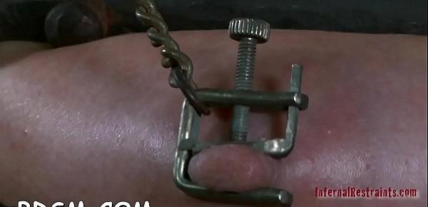  Slave has to wear a metal cage helmet  during fur pie torturing